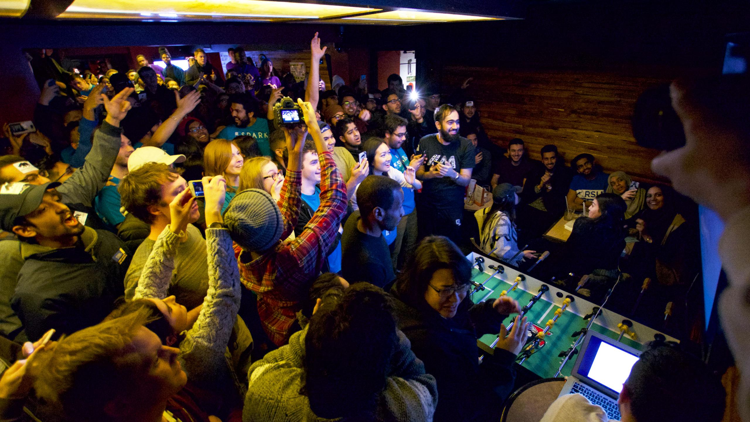 Crowd celebrates as results come in