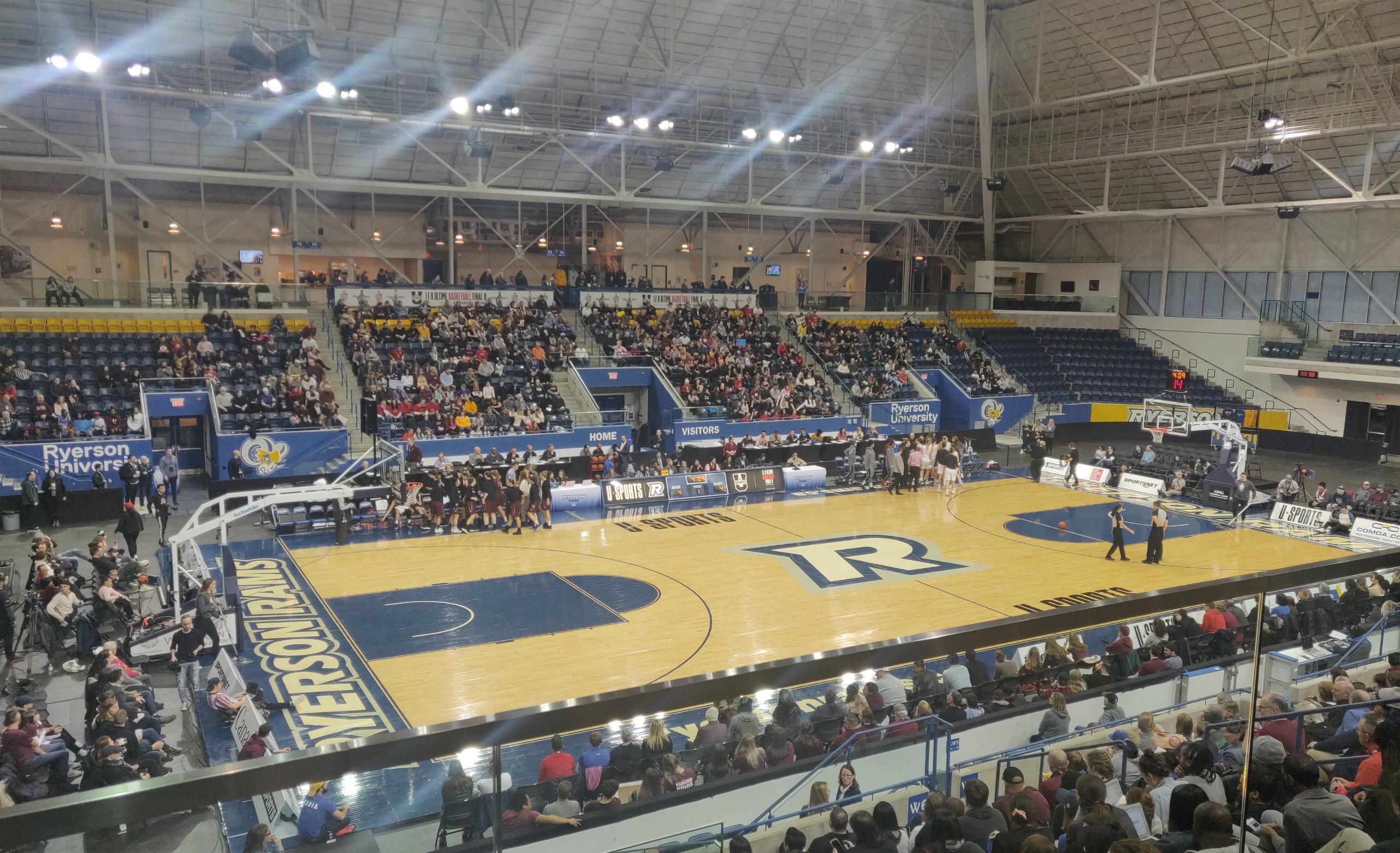 Fans fill seats at a sports stadium during the U Sports Final 8 Tournament