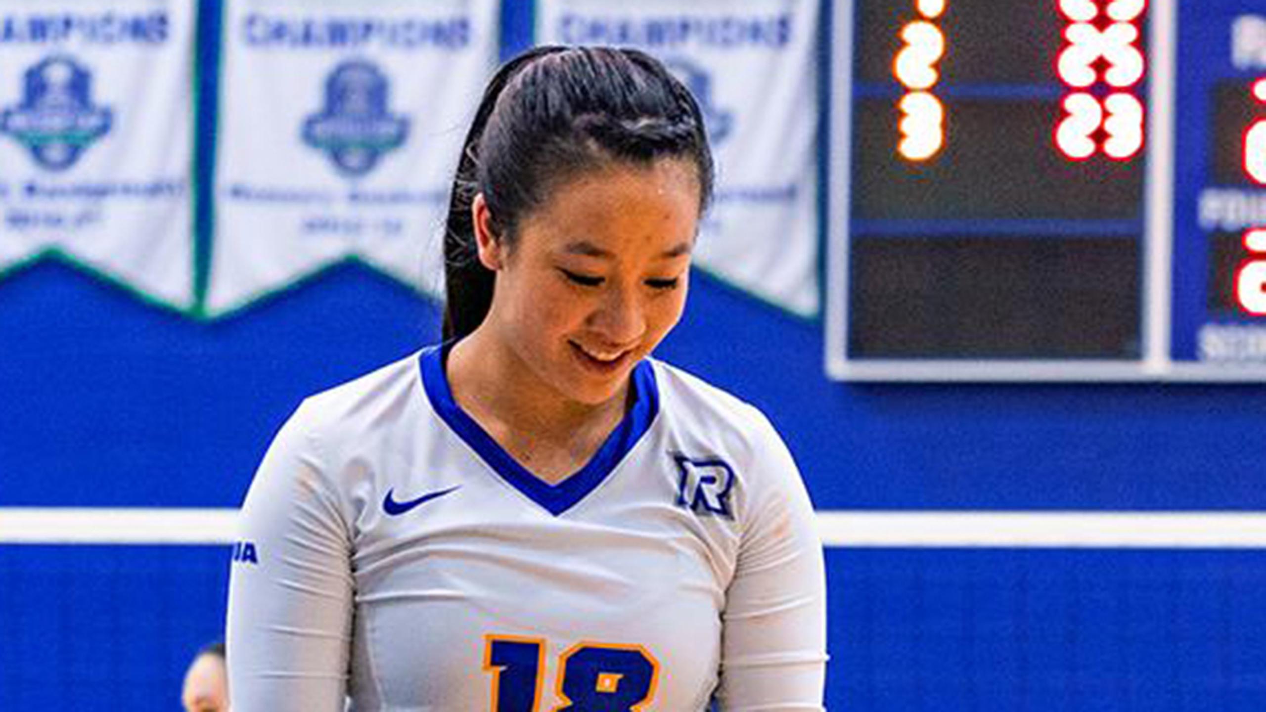 Photo of a Lauren Wong in a gym wearing a Ryerson Rams jersey.