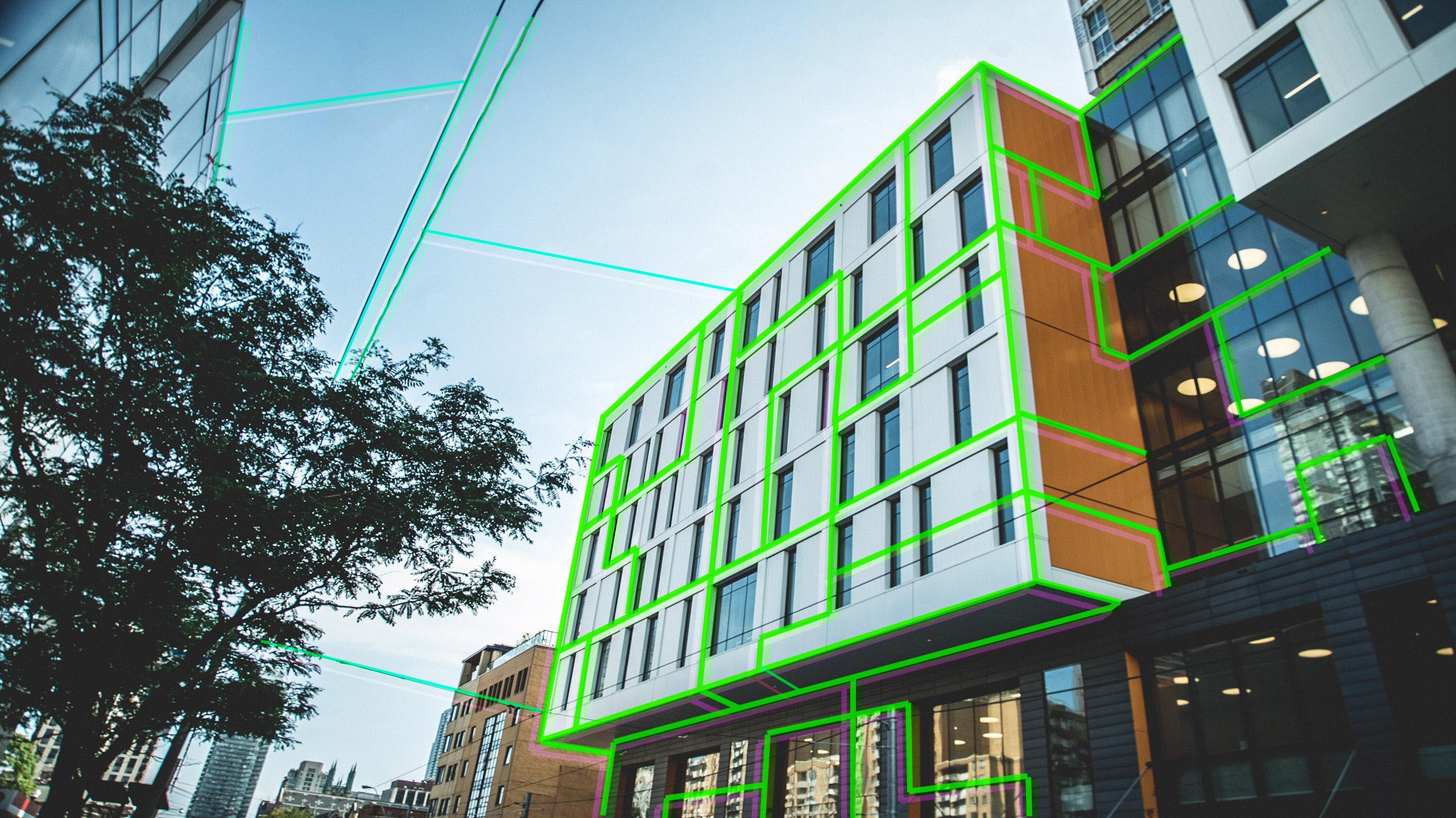 The Daphne Cockwell Health Sciences Complex with green lines illustrated across the building and its windows.