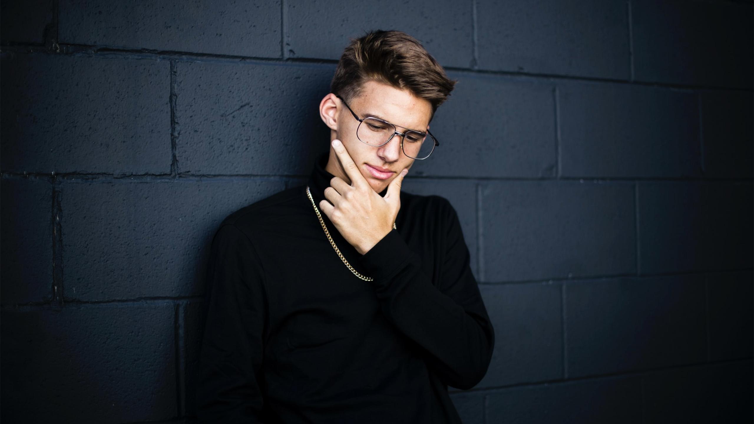 Douchey white guy contemplating.