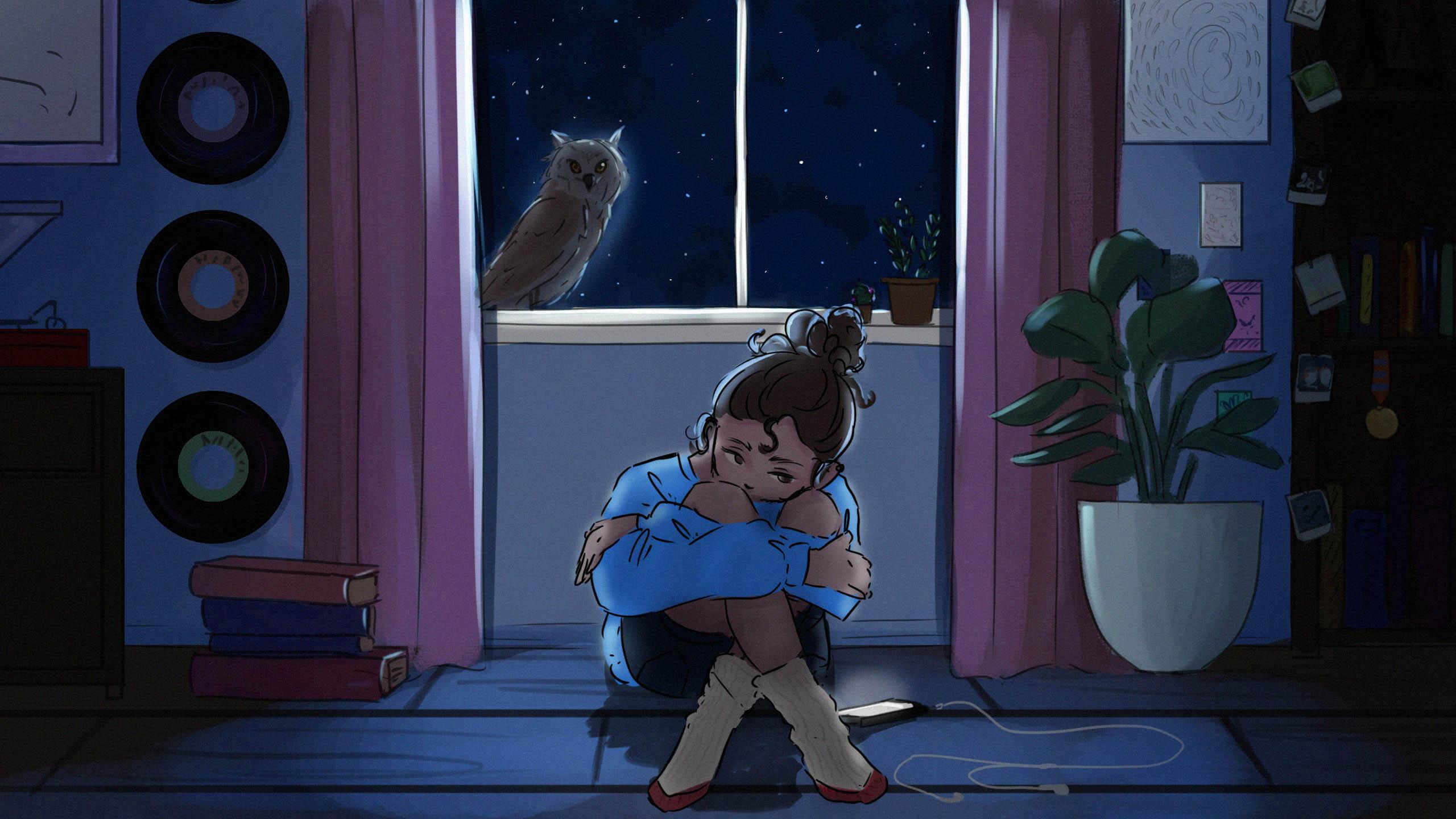 A person sitting cross legged in their room