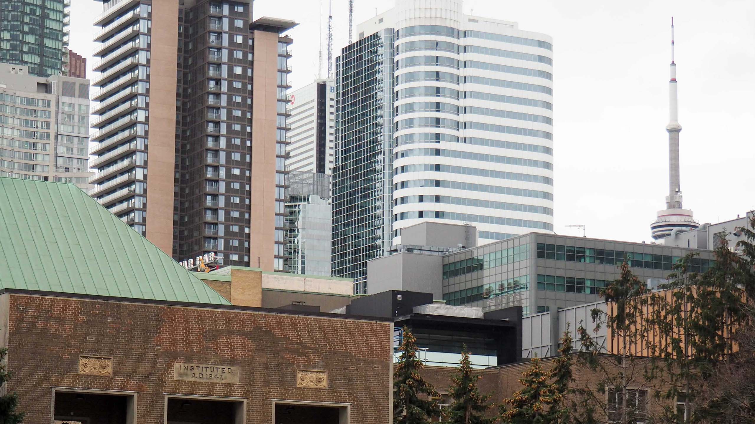 A photo of kerr quad with the CN Tower in the background