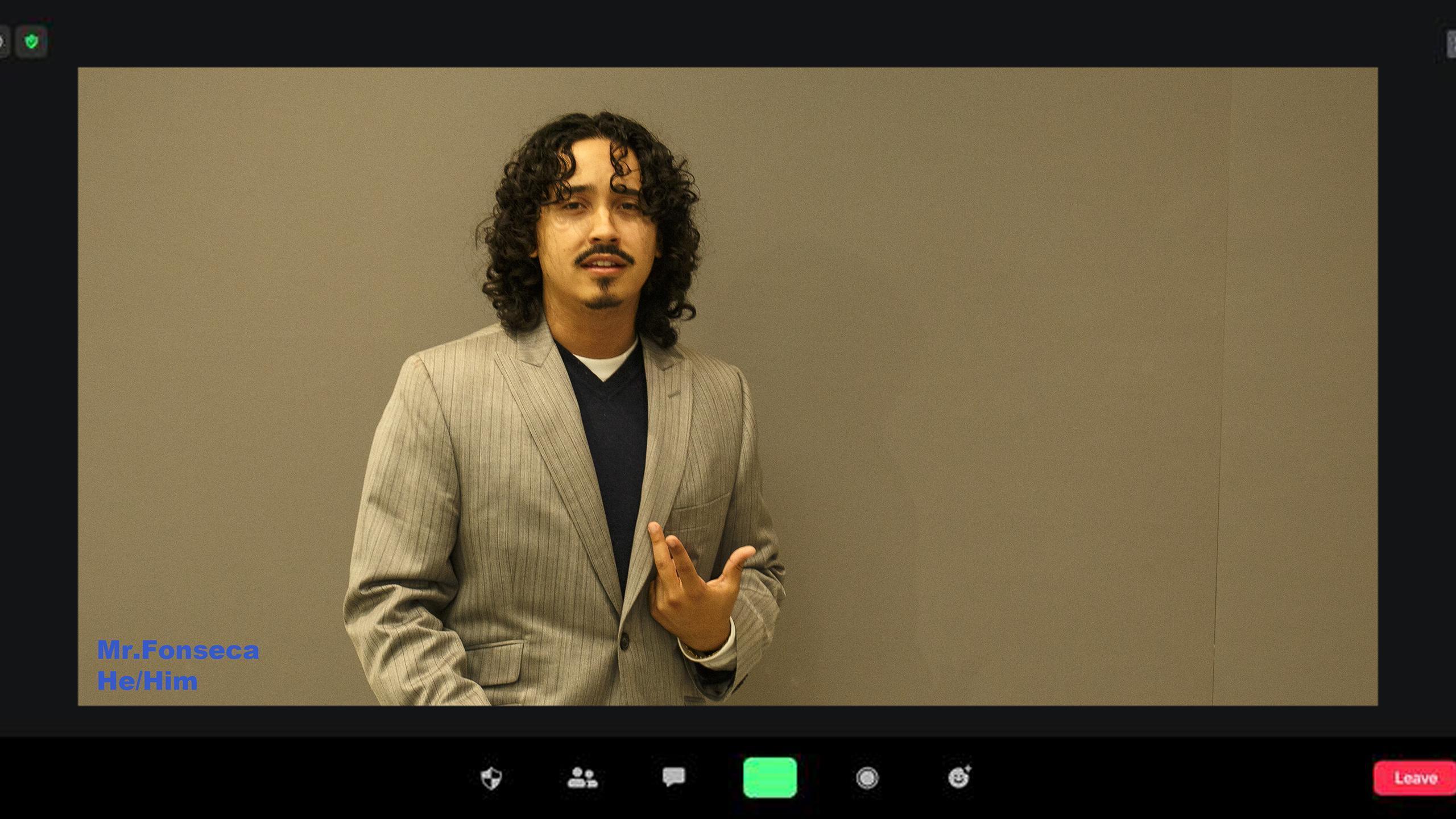 head portrait of student dressed as a professor over a zoom lecture