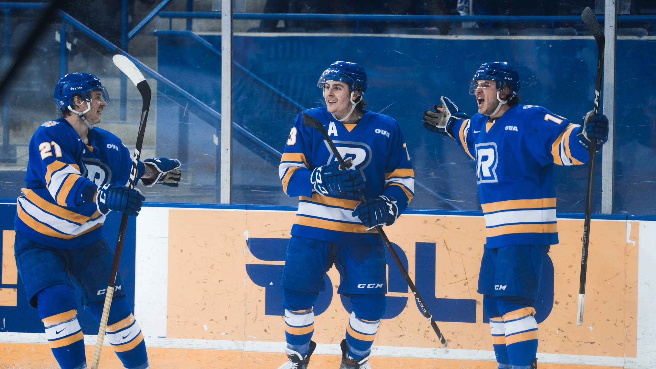 A hockey player in a blue jersey