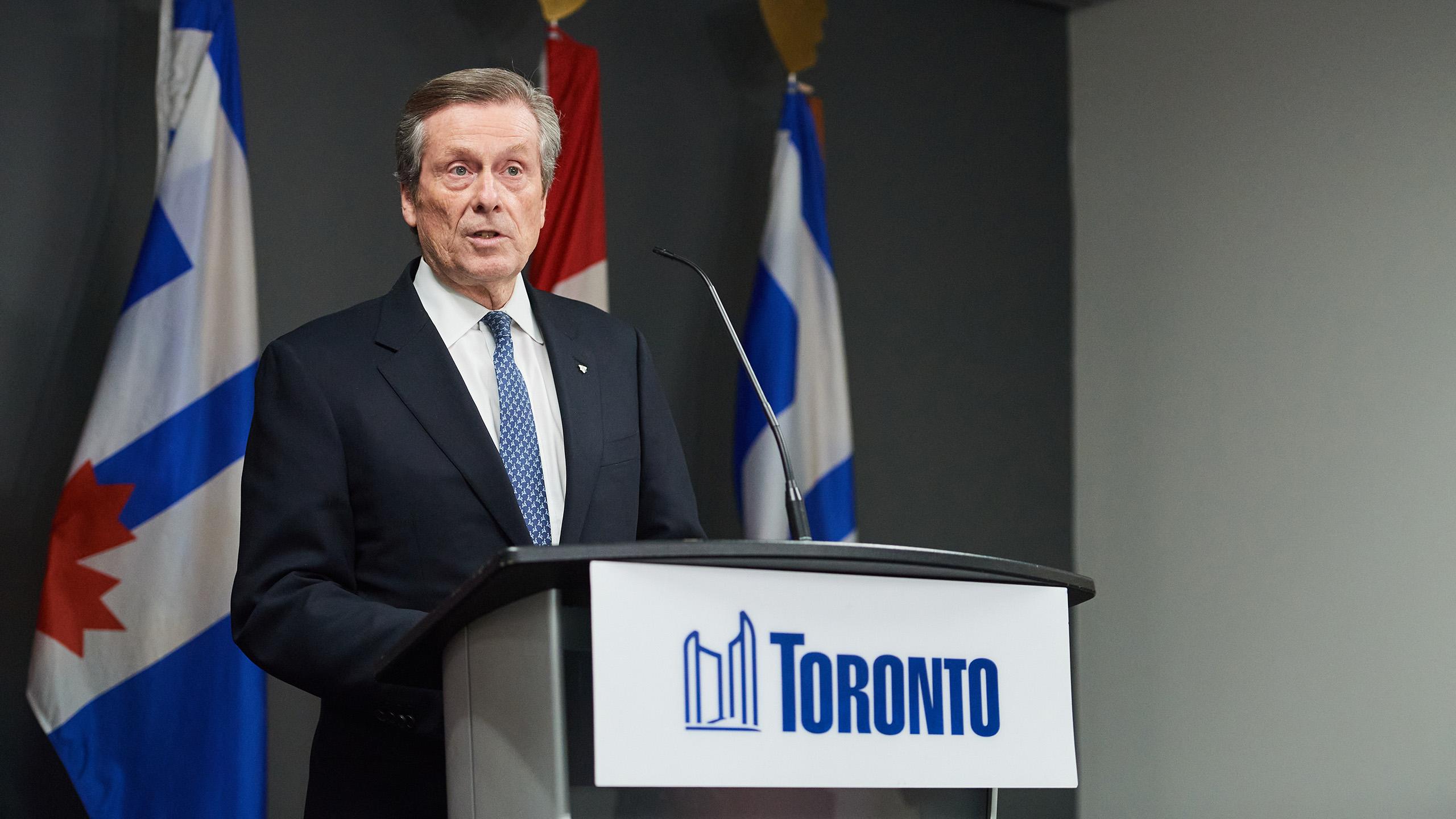 John Tory at a podium