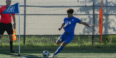 Bold men's soccer player Bilal Reslan prepares to take a corner kick