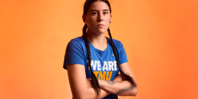 Volleyball player poses with her arms crossed