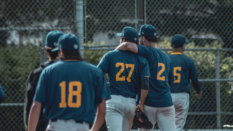 The TMU Bold men's baseball team walks off the diamond