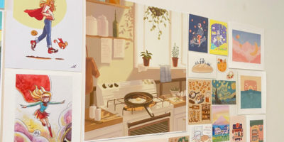 Various posters on a white wall