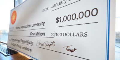 $1 million large cheque placed on windowsill upright.