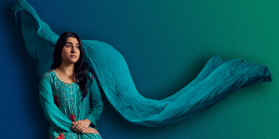 Composited portrait of Zoha in traditional formal clothing