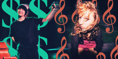 Two people pose in front of dollar signs and treble clef notes