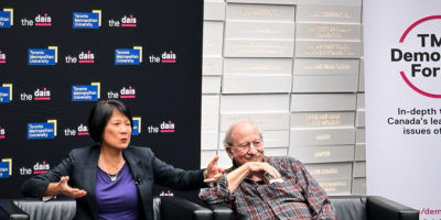 OLIVIA CHOW SPEAKS AT DAIS