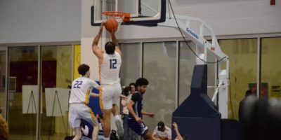 Aaron Rhooms shooting for two points against the Western Mustangs