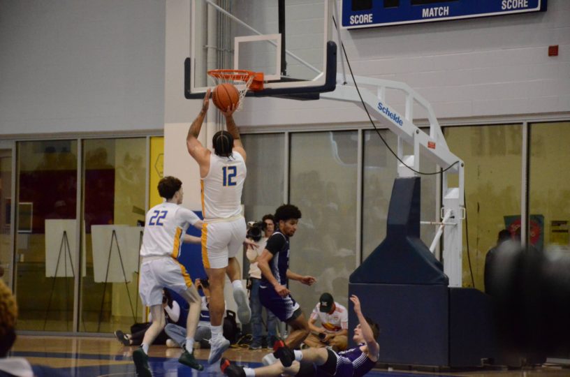 Aaron Rhooms shooting for two points against the Western Mustangs