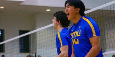 Evan Moua, the player of the game, celebrating a point