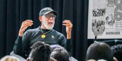 Dr. John Carlos giving a talk to the TMU Bold community on Feb. 4