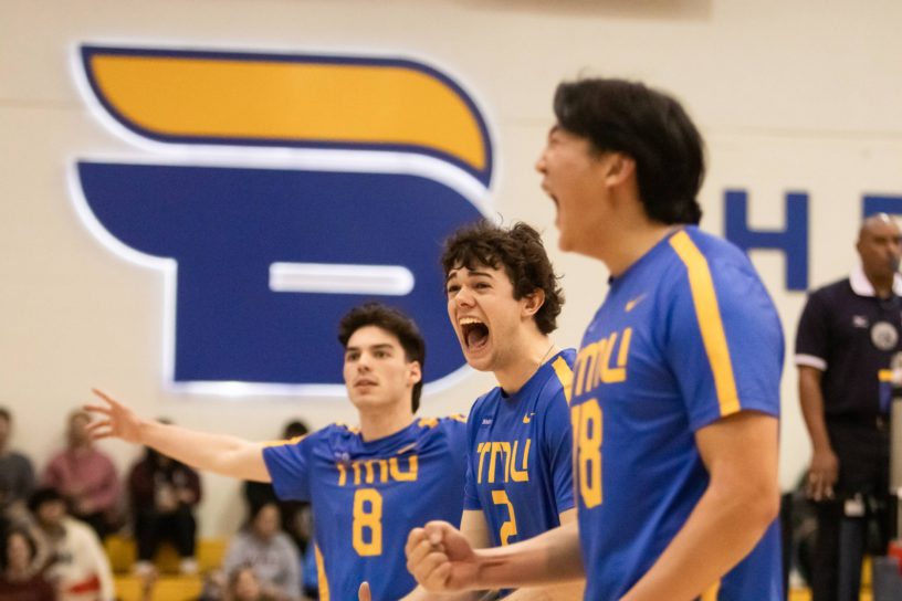 Three Bold players celebrating the win over the Lions in a season deciding game
