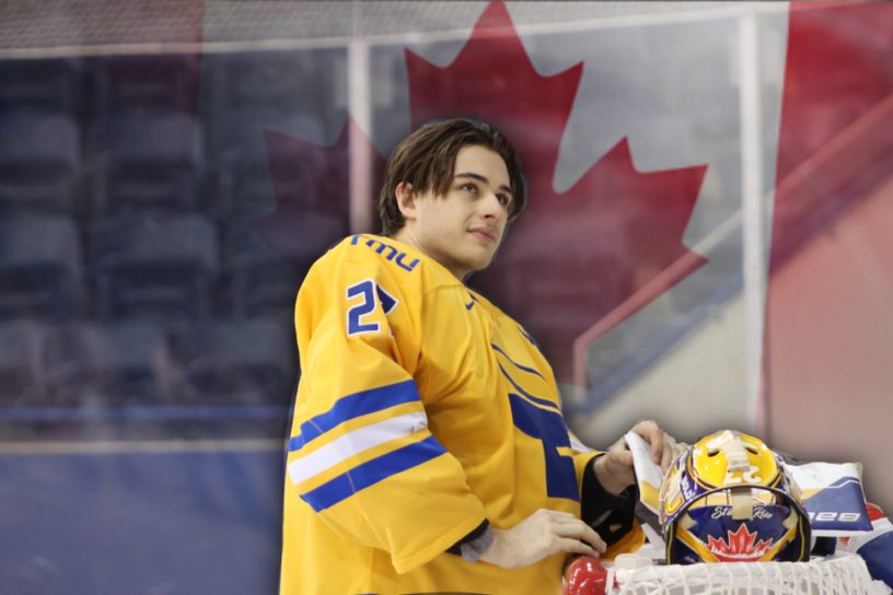 Kai Edmonds from the TMU Bold men's hockey team with the Canadian flag behind him