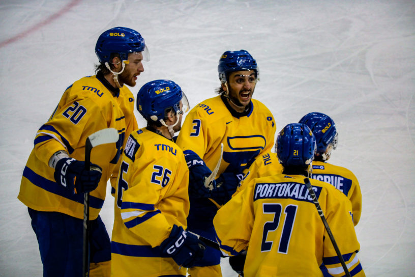 Joseph Iannello celebraing with his teammates