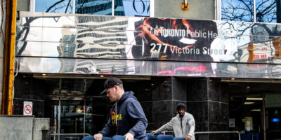 A photo of furniture being moved out of the 'The Works' building.