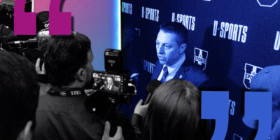 A color burned photo of Gee-Gee's head coach Patrick Grandmaitre being interviewed.