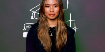 An image with illustrations of a phone, graduation cap, and text message bubbles behind the individual in the photo