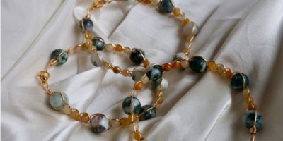 An image of jewelry on a white cloth