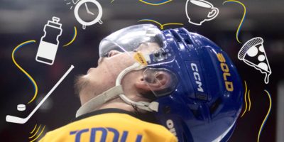 Spencer Shugrue looking up into the air through a foggy visor, with drawings of a hockey stick, water bottle, pizza, coffee and a clock hovering