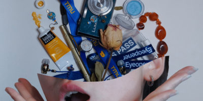 A collage of an individual's head split with random objects laid out on the upper half.