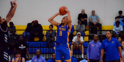 Deandre Goulbourne shooting 3 points for the TMU Bold