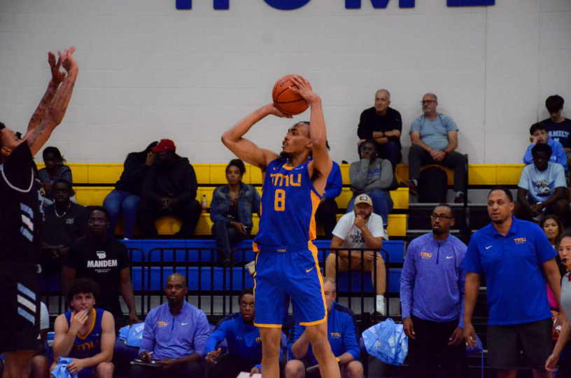 Deandre Goulbourne shooting 3 points for the TMU Bold