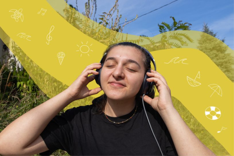 A girl with her hands on headphones listening to music, there are white illustrations in the background on top of a yellow stripe.