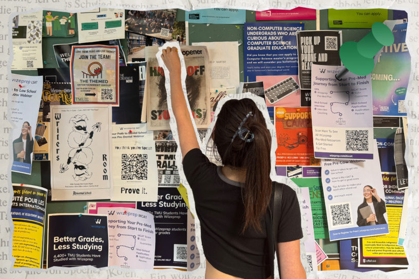 Composition of a student in the middle of a poster board with their arm up.