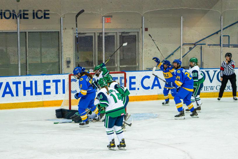 TMU celebrates a goal