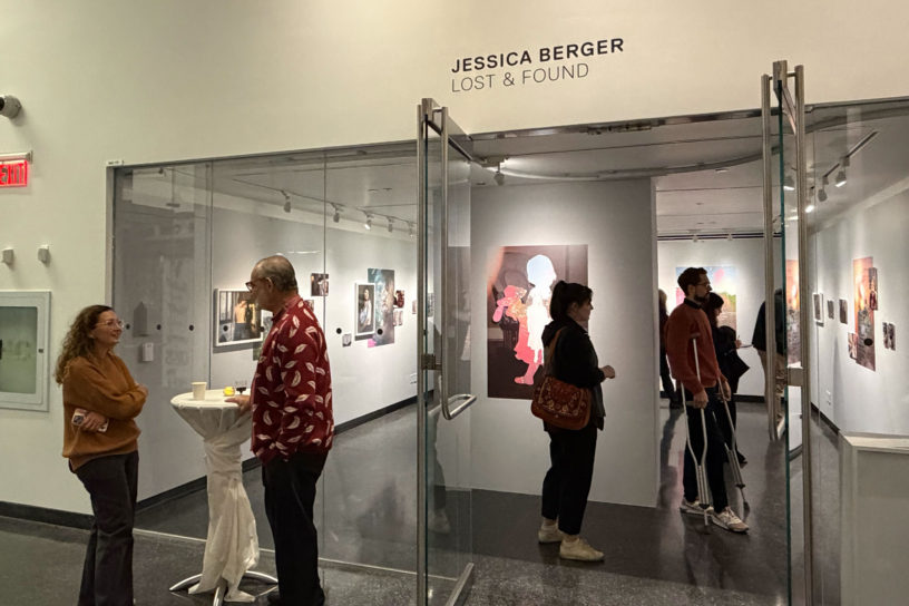 Image of an art exhibit at the Image Centre, there is a sign that reads "Jessica Berger" and Lost & Found."