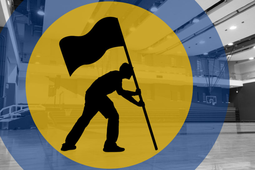 Silhouette of a person holding a flag in a basketball court with illustrations of blue and yellow circles surrounding them.