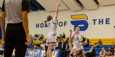 Catrina Garvey attempts to make a basket