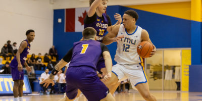 TMU player double teamed