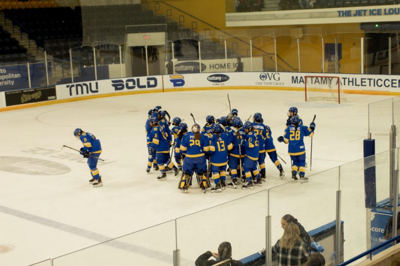 TMU celebrates their hard-fought overtime win